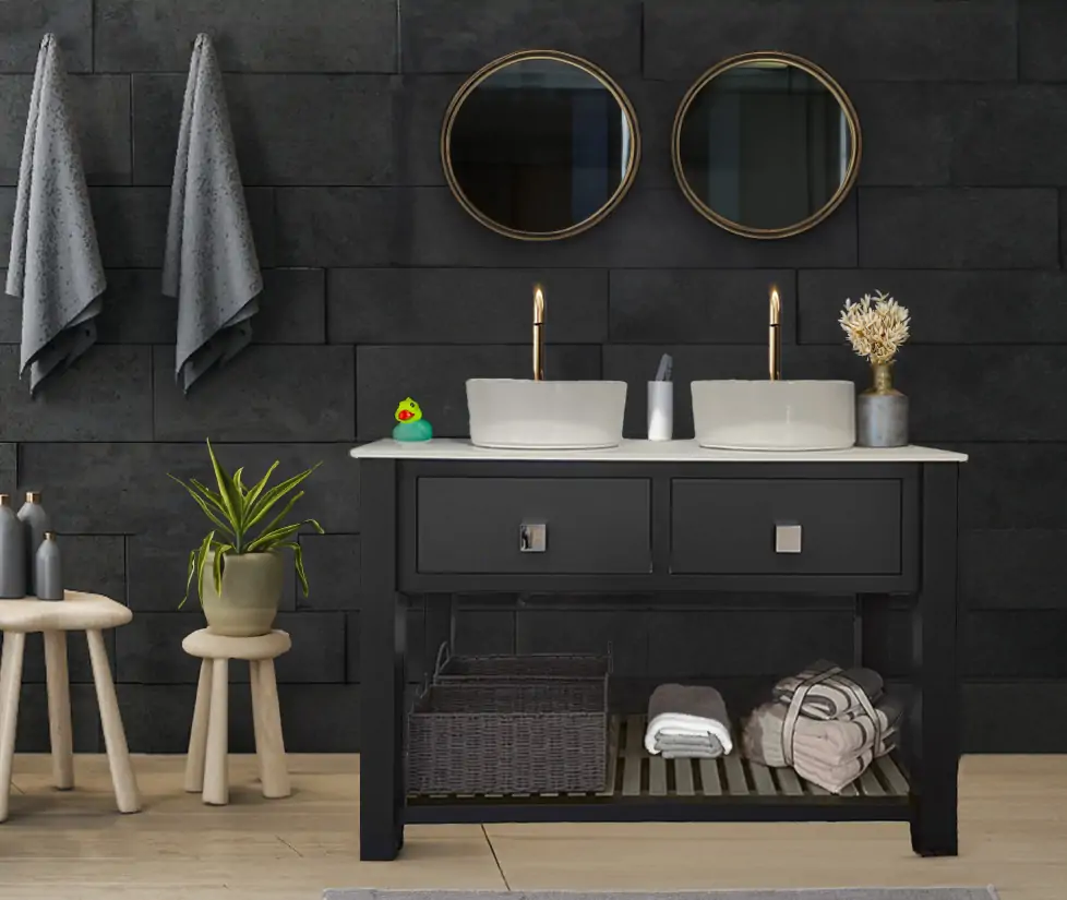 A grey stone bathroom with a double charcoal grey vanity unit, with towels stored underneath